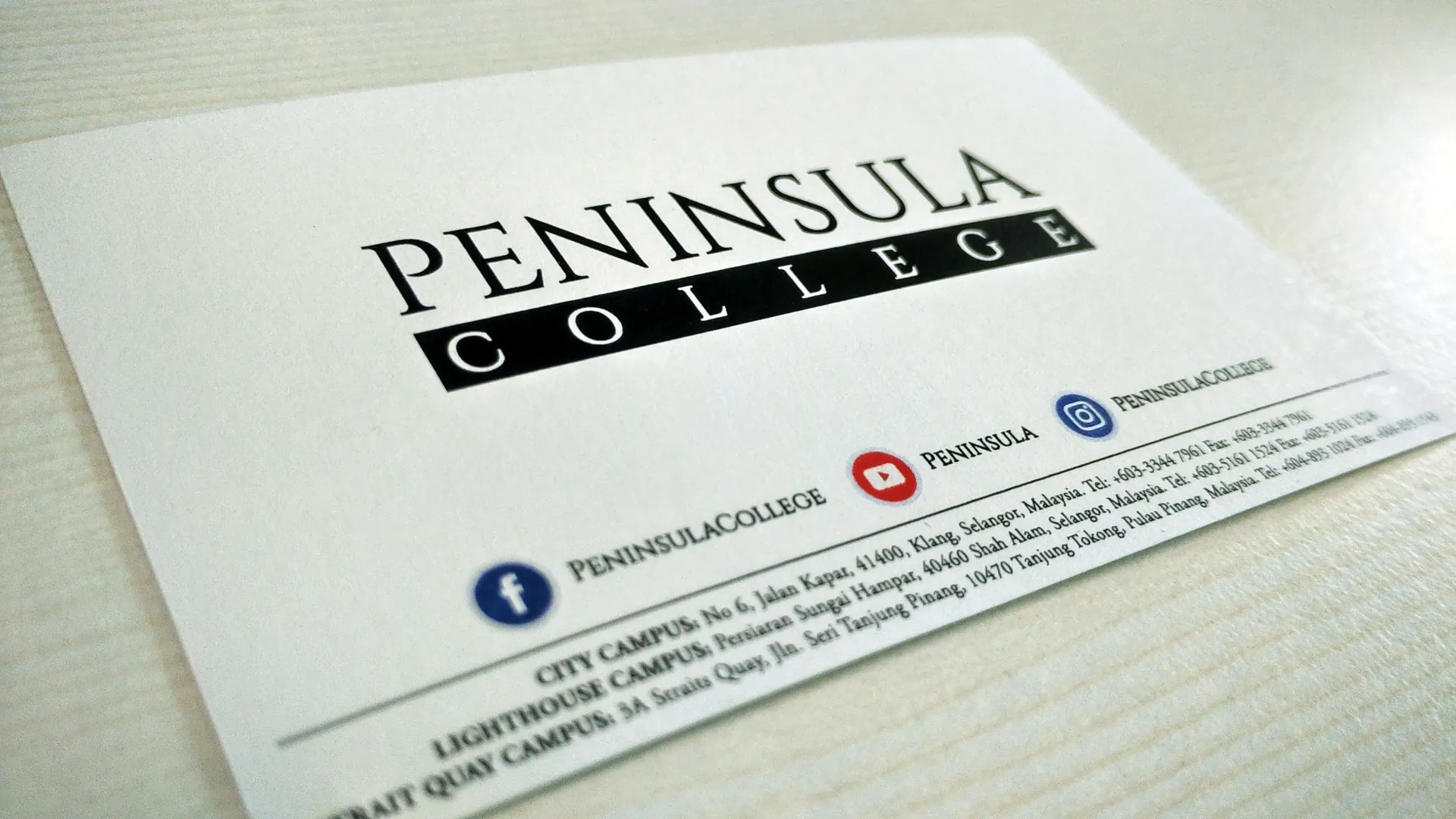Peninsula College branding card design, back side